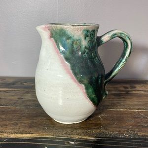 Adorable pottery price.  Handmade.  Gorgeous greens and pinks with a gold vein